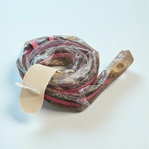Hot pink leather replacement crossbody strap. Approx 43” w center adjustment